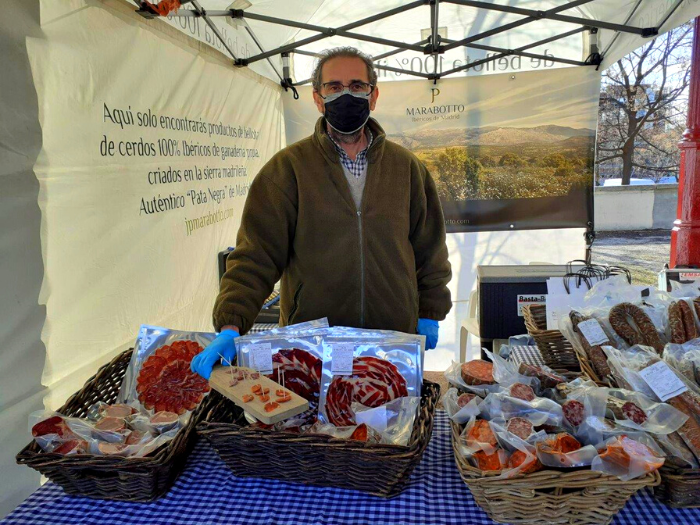 Vendedor en un puesto del Mercado de Productores de Planetario